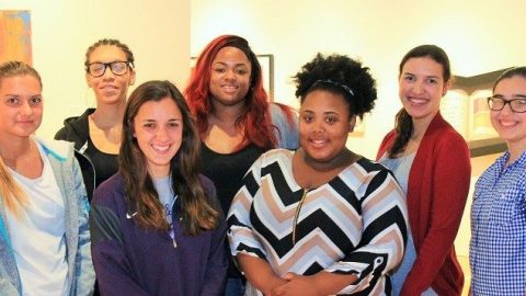 Group of seven young teaching assistants at the Mississippi Museum of Art