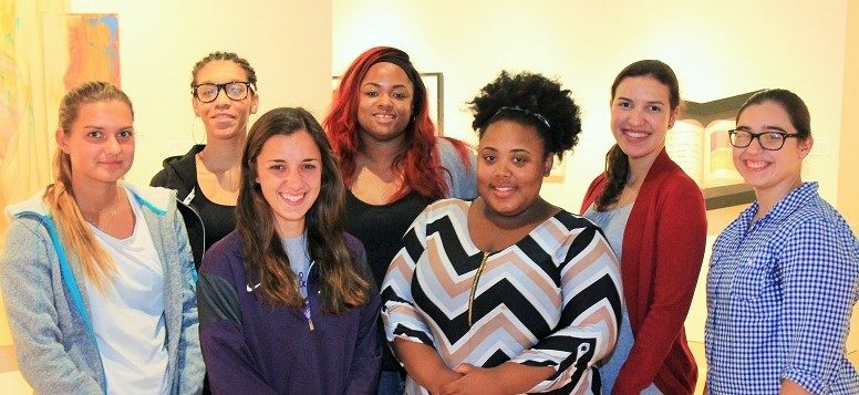 Group of seven young teaching assistants at the Mississippi Museum of Art