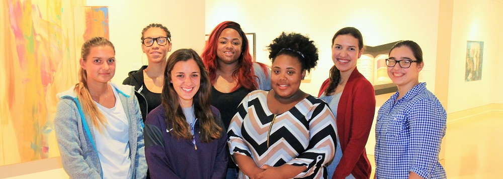 Group of seven young teaching assistants at the Mississippi Museum of Art