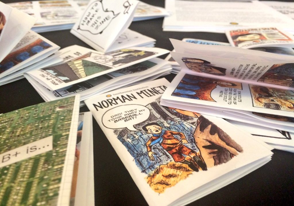 Image of comic books strewn on the table