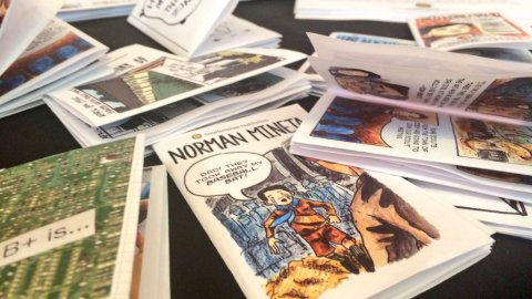 Image of comic books strewn on the table