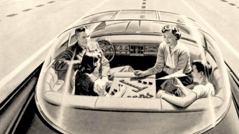 People in a futuristic car.