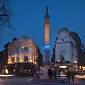 Image of London with lighted blue circle showing where sea could rise on buildings.