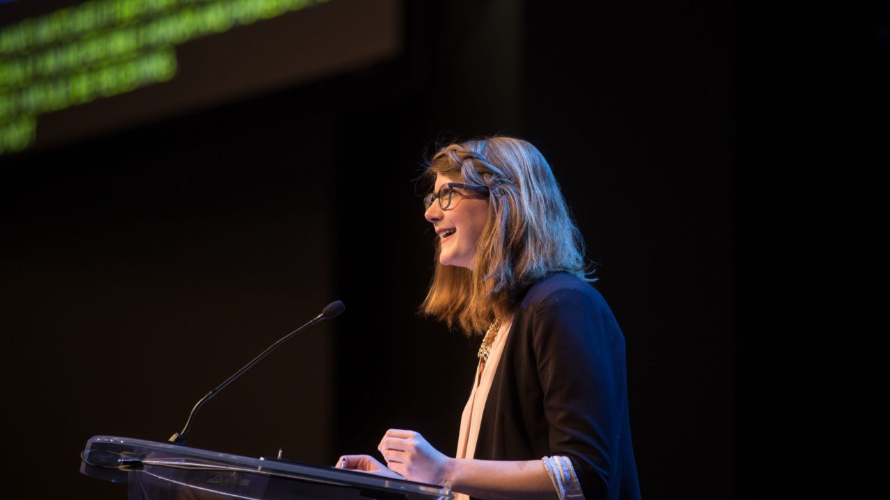 Emily Graslie at the podium of the 2017 Annual Meeting