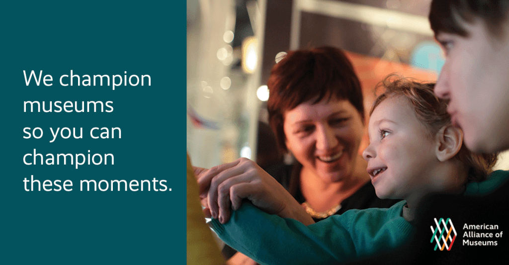 Photo of two children with a woman looking at a museum display. Text reads "We champion museums so you can champion these moments."