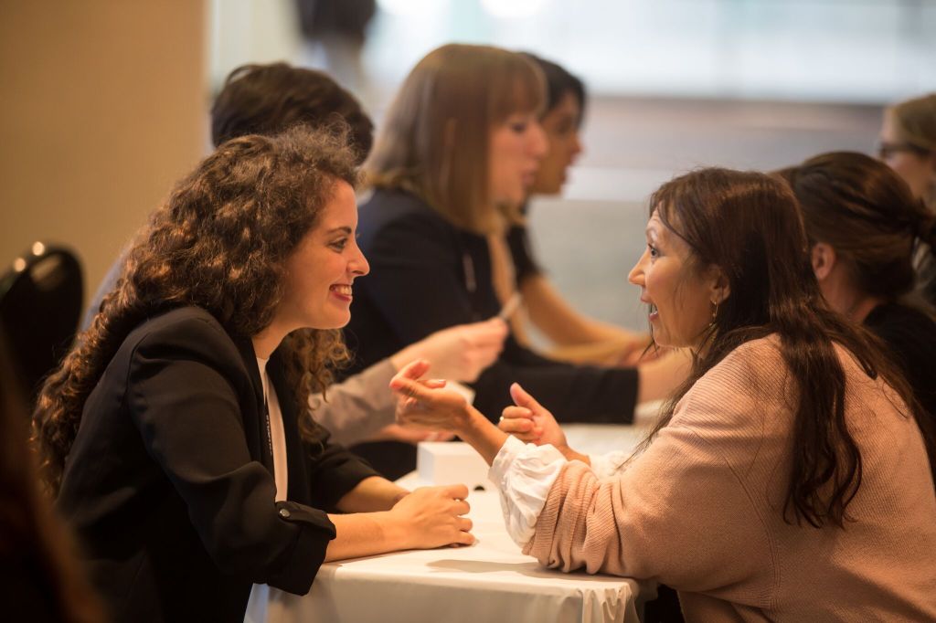 Two women getting to know each other at Speed Networking.