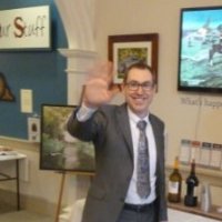 Photo of Jason Illari waving.