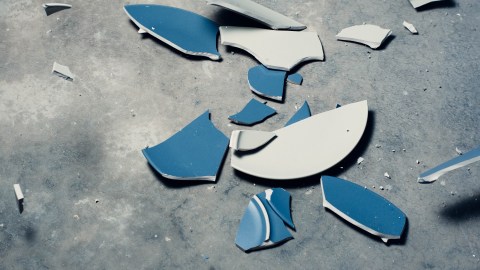 A broken pottery cup.