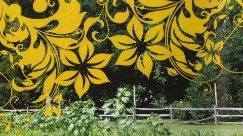 Image of a historic site garden with yellow filigree flowers superimposed over of the image.