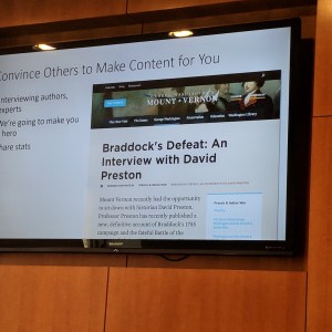 View of a screen with "Convince Others to Make Content for You" displayed on it.