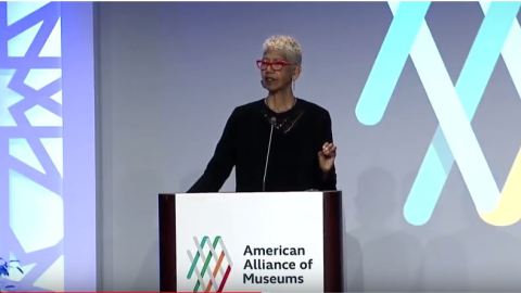 Image of Erica Huggins on stage at the AAM Annual Meeting in Phoenix, AZ
