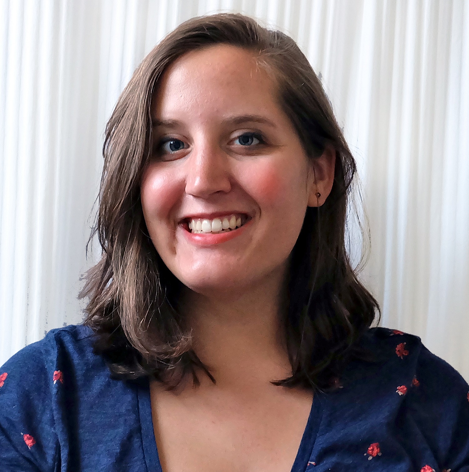 Shaelyn smiles at the camera in this headshot.