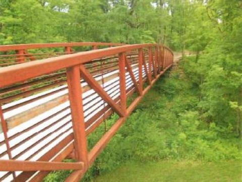 the Crystal Bridges Museum ofAmerican Art includes miles of trails on its wooded site.