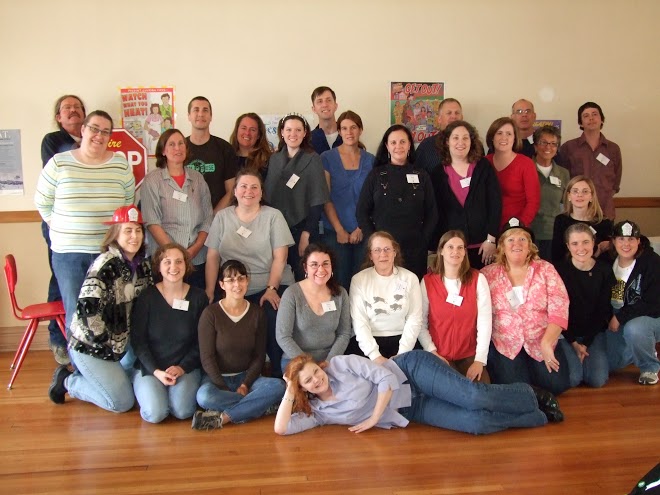 A group of people pose for a picture.
