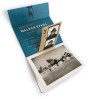 View of an invitation open with various pages inside with Walker Evans' images. 