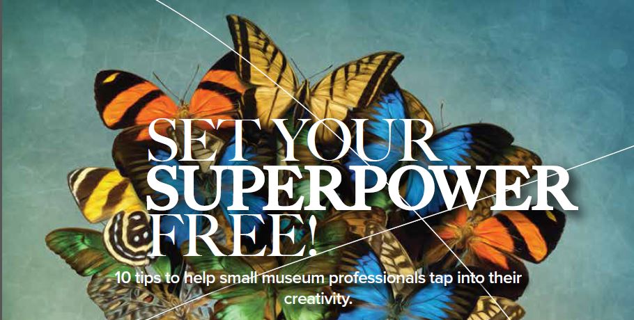 A group of colorful butterflies in the shape of a hot air balloon lift a basket off the ground with the words "Set Your Superpower Free!" on top in white letters.