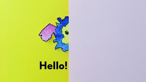 Half of Marabou's head peeks out behind a white sheet of paper, and text below says "Hello!" Marabou has floppy purple ears, a fluffy blue head, and a yellow face with beady eyes.