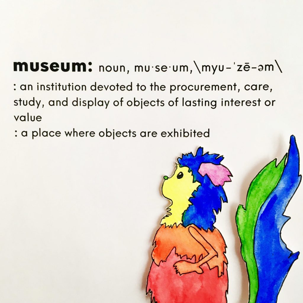 Marabout is shown in front of a dictionary definition for the word museum. They are seen in profile and have a multicolored coat of purple, blue, yellow, red, and green. The definition reads: "Museum: an institution devoted to the procurement, care, study, and display of objects of lasting interest or value; a place where objects are exhibited."