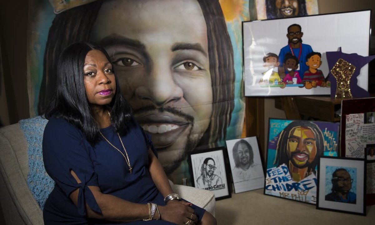 Valerie Castile in her home with works of art produced in memory of her son, Philando.