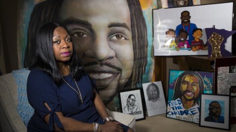 Valerie Castile in her home with works of art produced in memory of her son, Philando.