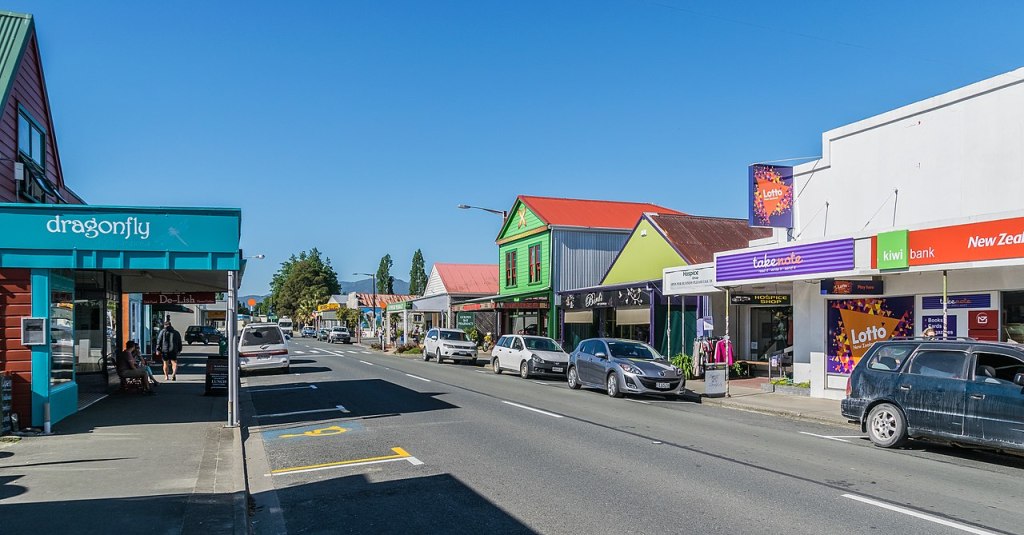 A colorful main street in Golden Bay.