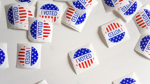 A sprinkling of unused "I Voted" stickers.