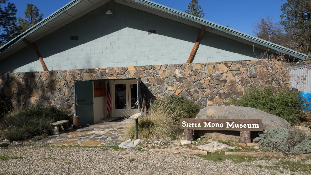 An exterior shot of the small, cinderblock Sierra Mono Museum.