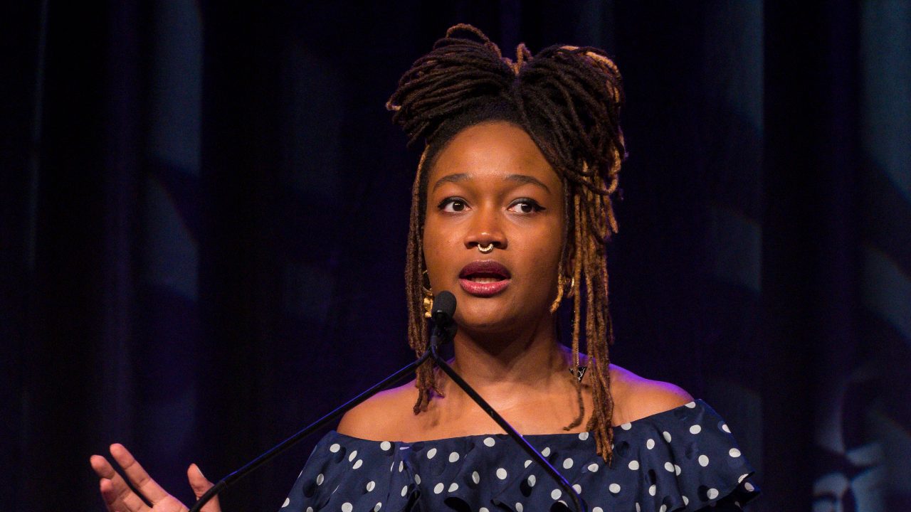 Kimberly Drew speaking at a podium