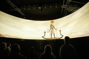 A projection screen with an image of King Tut on it