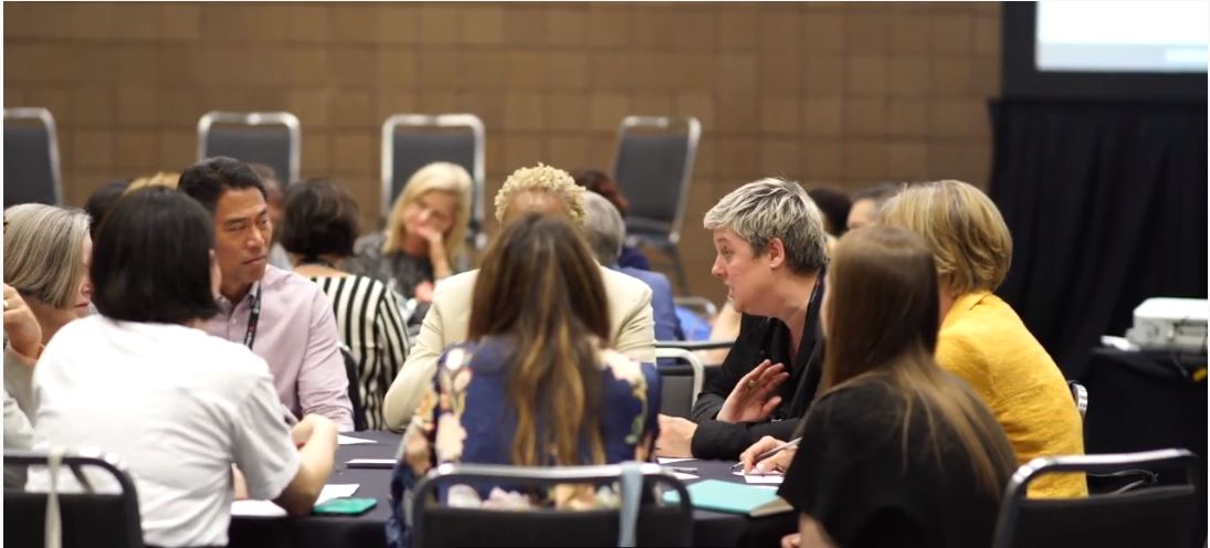 A group of people sitting around a table at the AAM Annual Meeting and MuseumExpo in New Orleans in 2019.