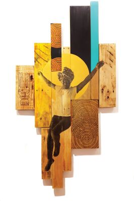 Art piece showing a woman jumping with her arms outstretched in front of a yellow round shape painted/affixed to a series of varying sized wooden panels. 