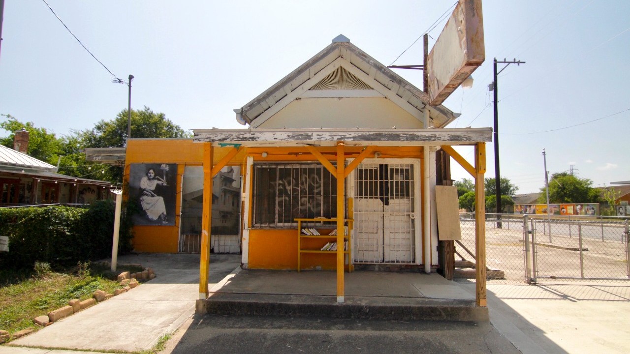 A small yellow-painted storefront