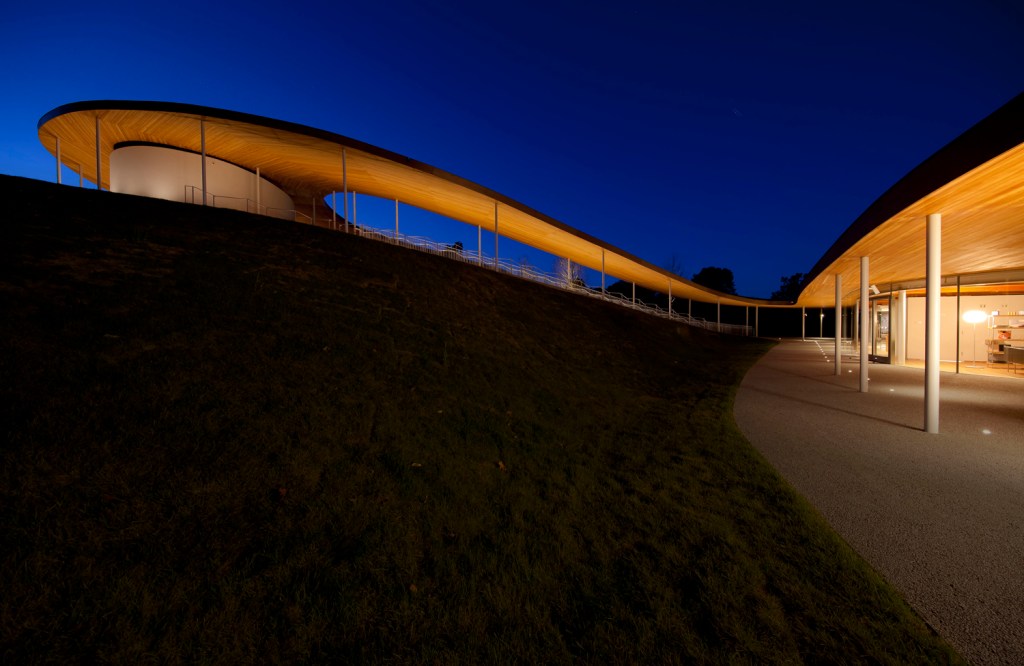 A building whose facade extends into an outdoor pavilion