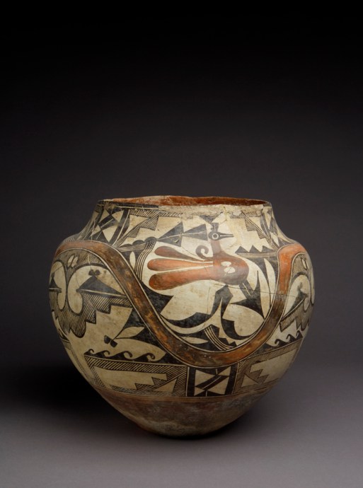 A pot decorated with geometric designs and a bird motif