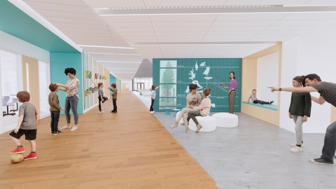 Rendering of a school interior where students, parents, and teachers engage with architectural features like a seating nook and a wall displaying an educational diagram