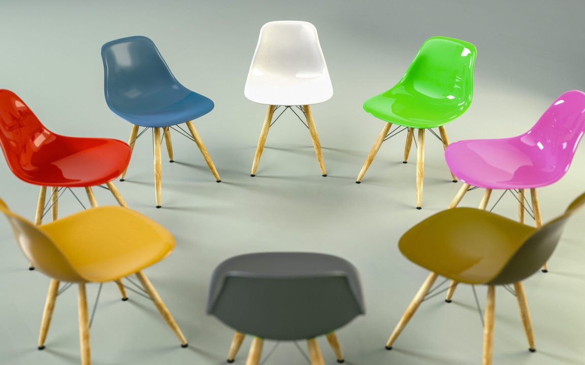 A circle of chairs in different colors