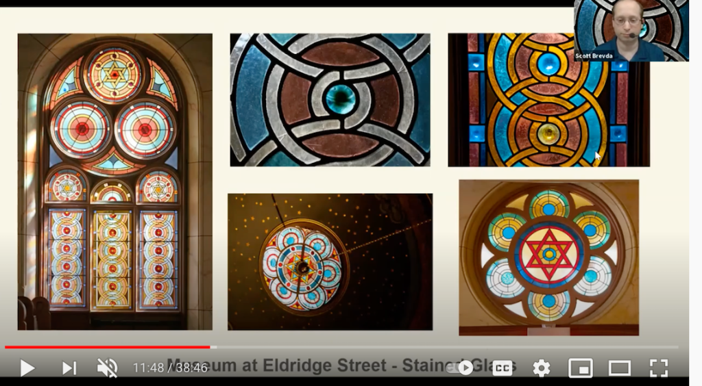 A screenshot of a Zoom program with a presentation showing details of stained glass windows and a presenter from the museum speaking in the corner
