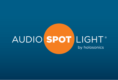 Logo reading "Audio Spotlight by Holosonics" with the word "spot" contained in an orange dot