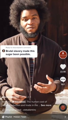 A screenshot from the Old Salem TikTok account replying to a comment reading "Brutal slavery made this sugar boon possible"