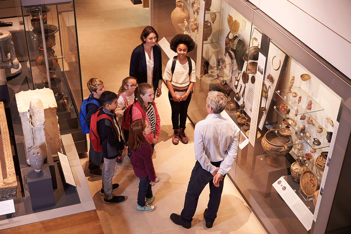 A photo of a school group visiting a museum