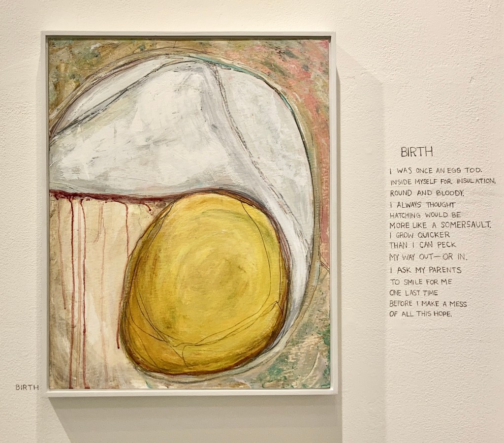 An abstract painting resembling a hard boiled egg next to a poem titled "Birth."