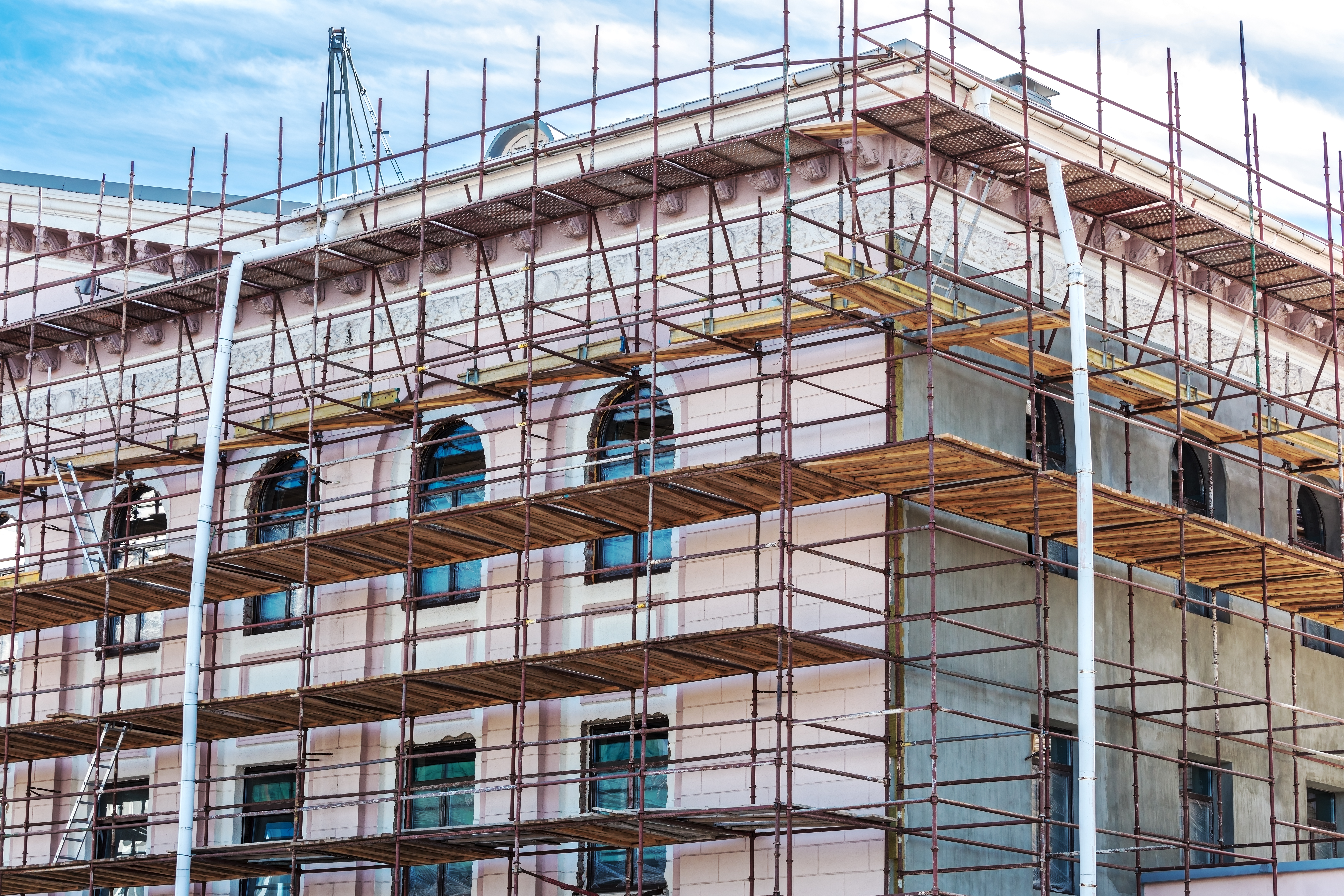 a photograph of a building with scaffolding 