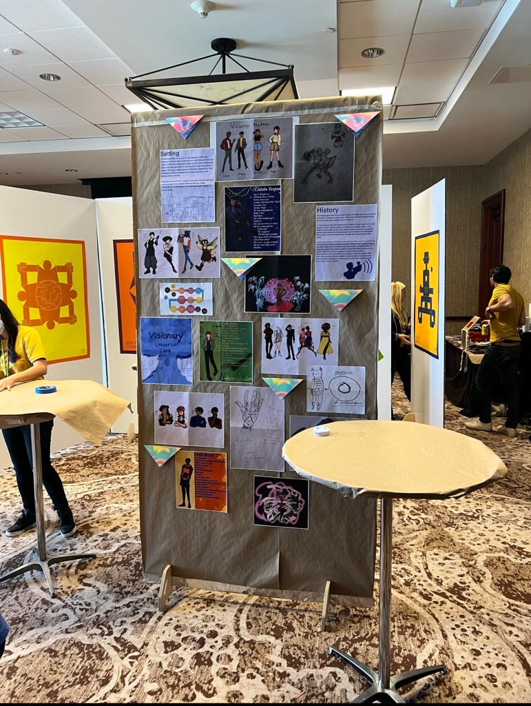 A poster board in a convention center setting with drawings of student projects showing futuristic concepts and inventions