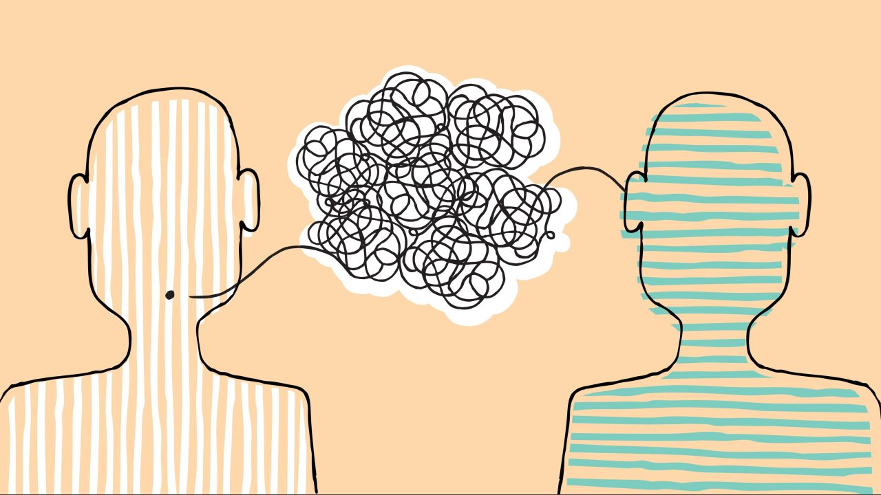 A drawing of two human outlines with a scribble form in between their heads