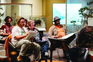 Visitors sketch a live drawing session at Oakland Museum of California's Thursday After Hours programming.