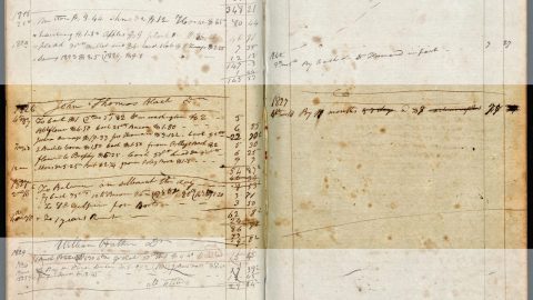A book with handwritten notes and writing, a page from Roger Brooke’s ledger.