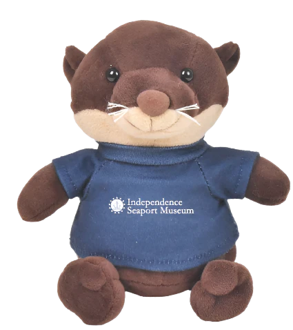 A plush otter wearing a t-shirt that reads "Independence Seaport Museum"