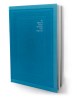 View of an open book with a light blue cover with an embossed pattern on the front cover. 