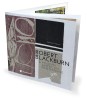 View of the Robert Blackburn exhibition promotional booklet with the drawing of a calligraphy pen and other images on the front. 