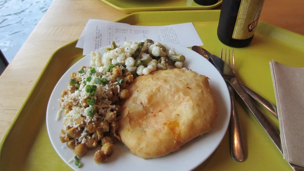 A plate of fry bread with salads